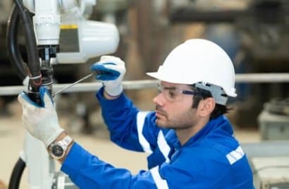 Instrument technician performing field checks